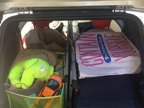 View of the Fiat 500e with a fully packed trunk.