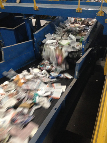 The belts move so quickly through the center! They process a lot of recyclables in a full 8 hour day!