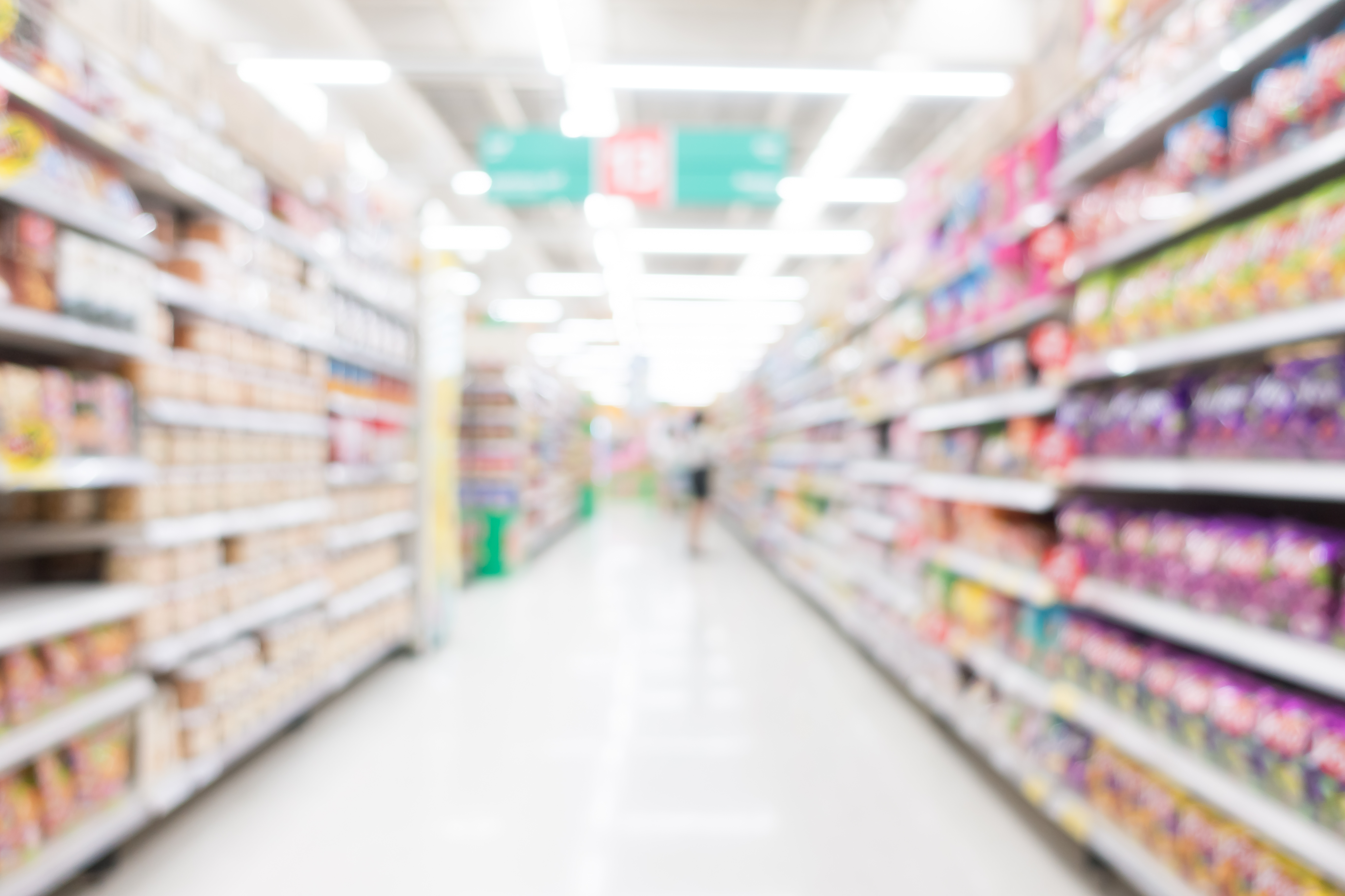 blurred view of supermarket aisle courtesy of Deposit Photos