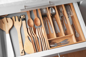 organized utensil drawer in a kitchen