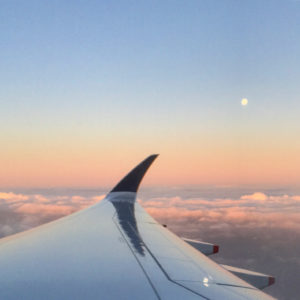 Sunrise reflecting on a full moon over San Francisco