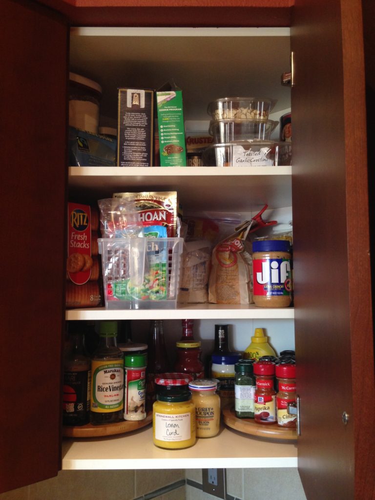 Make the most of those corner cabinets by using lazy susans so you can see all your food.