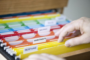 Color coded paper files are key to keeping organized for LMOI