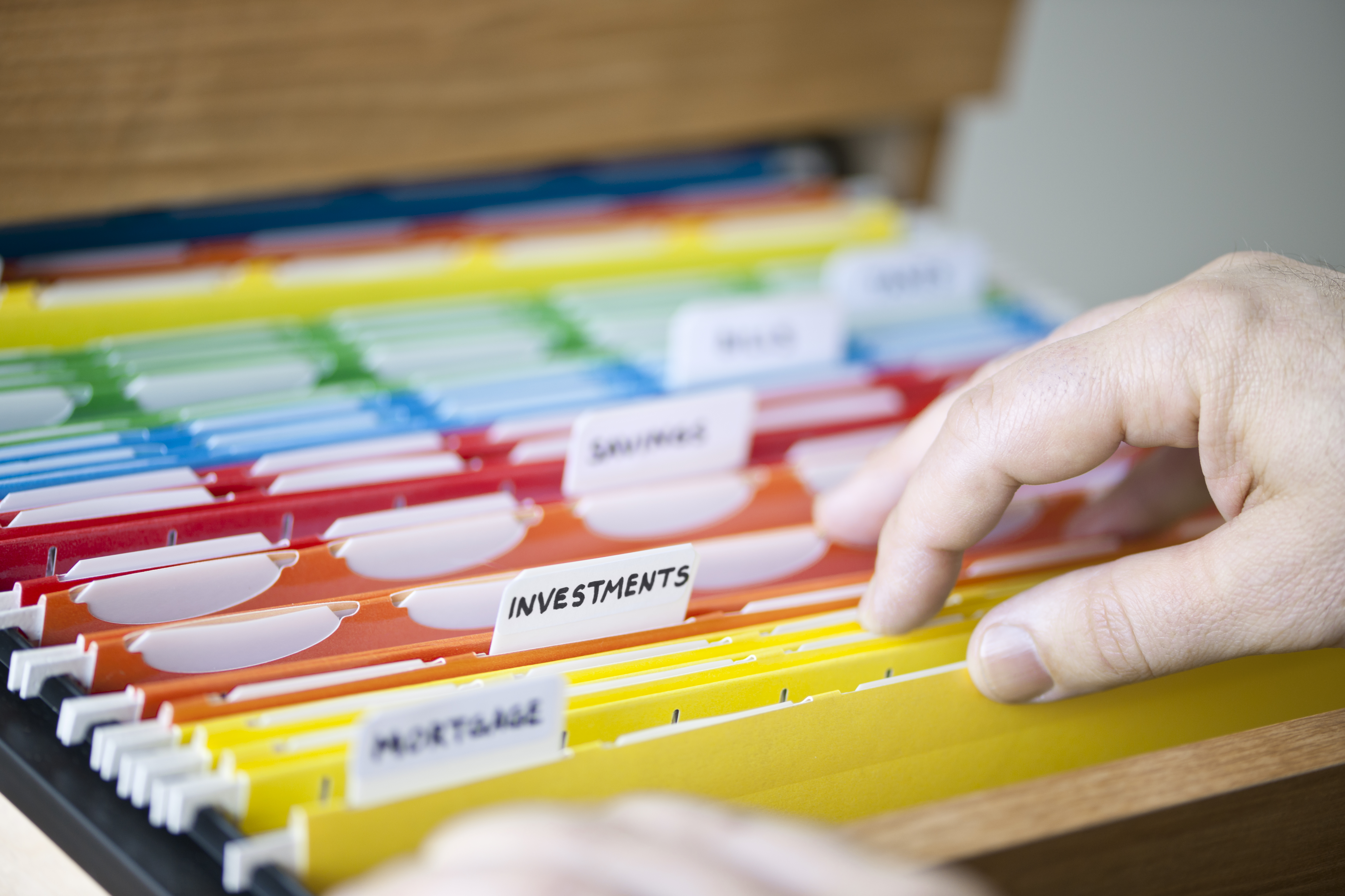 Color coded paper files are key to keeping organized for LMOI