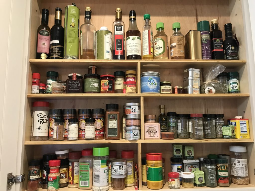 Example of one of my client's newly organized spice cabinet, post move/unpack.